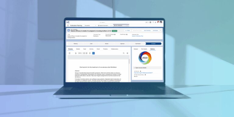 A laptop displays an academic journal article submission interface with manuscript details, progress steps, and a circular progress chart on the screen.