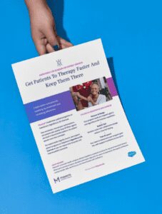 A person holds a printed flyer titled "Get Patients To Therapy Faster And Keep Them There," featuring information about healthcare and patient services against a blue background.